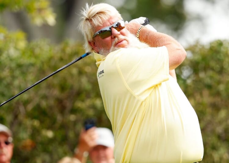 John Daly of the United States plays his tee shot on the third hole during the first round of the Sanford International in Sioux Falls, South Dakota, on Sept. 15. In a recent interview with Tucker Carlson, Daly admitted he has a major habit - drinking Diet Coke.