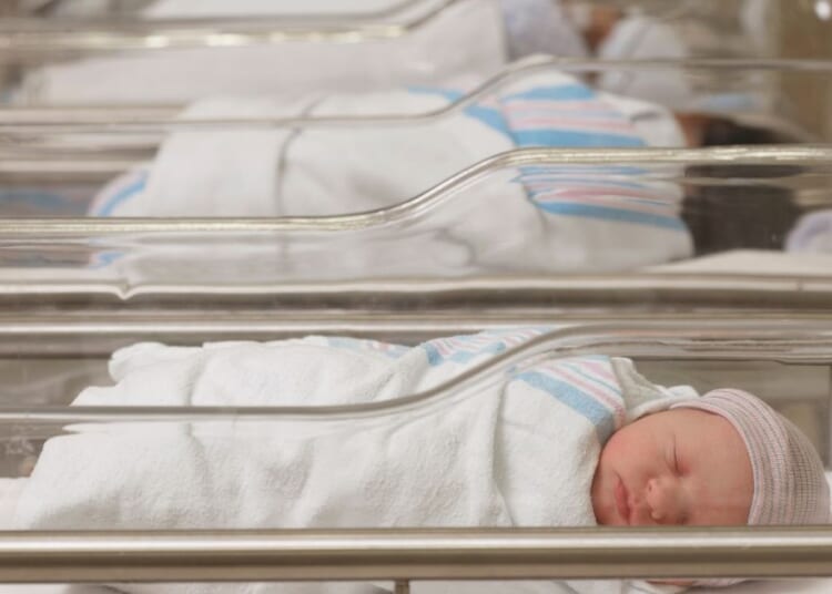 Newborn babies sleep in a hospital nursery. Naming newborns gender-neutral names is becoming the new trend in America, following the progressive LGBT agenda moving through the nation.