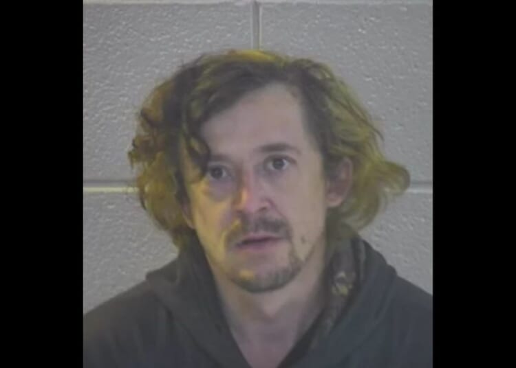 This YouTube screen shot shows the mug shot of Zackary Jones, who stands accused of a number of crimes in both North Carolina and Kentucky.